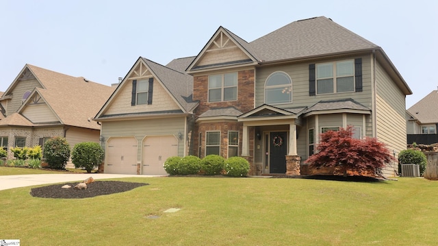 354 Harkins Bluff Dr, Greer, SC 29651 - craftsman house with concrete driveway, a front yard, stone siding, and a shingled roof