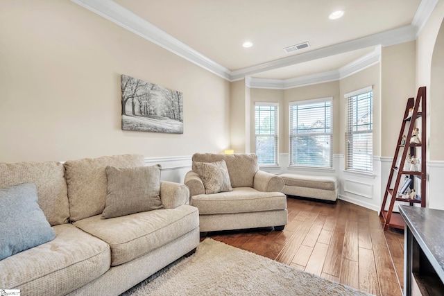 354 Harkins Bluff Dr, Greer, SC 29651 - living area featuring dark wood-type flooring, crown molding, a wainscoted wall, recessed lighting, and a decorative wall