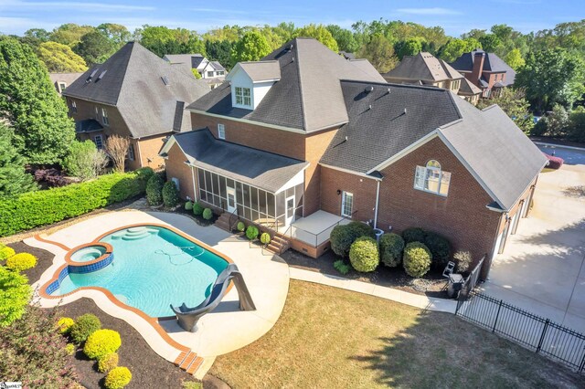 201 Corinthian Dr, Simpsonville, SC 29681 - view of pool with a sunroom, a patio area, a water slide, and a pool with connected hot tub