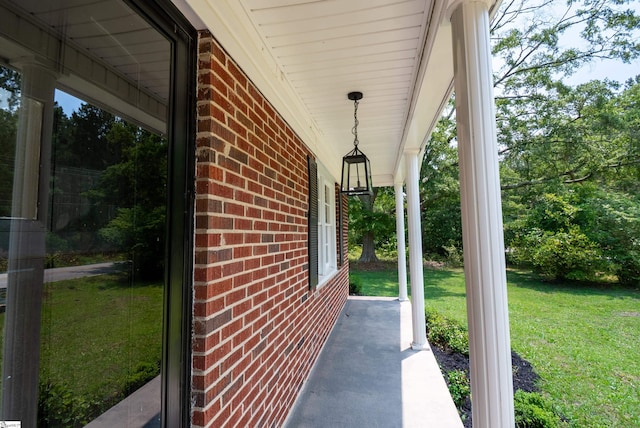 231 E Hampton Ave, Honea Path, SC 29654 - porch featuring a lawn