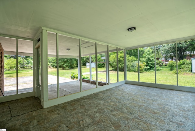 231 E Hampton Ave, Honea Path, SC 29654 - unfurnished sunroom featuring stone floors