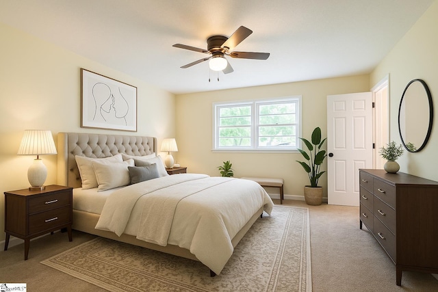 231 E Hampton Ave, Honea Path, SC 29654 - bedroom with light colored carpet, baseboards, and a ceiling fan