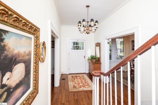 102 Todd Ave, Laurens, SC 29360 - entrance foyer featuring wood finished floors, a chandelier, crown molding, and stairway