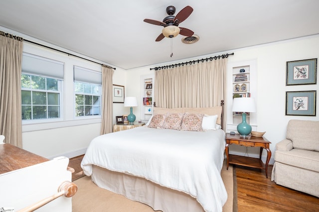 102 Todd Ave, Laurens, SC 29360 - bedroom with wood finished floors, baseboards, and ceiling fan