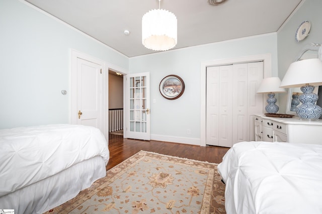 102 Todd Ave, Laurens, SC 29360 - bedroom with ornamental molding, wood finished floors, a closet, and baseboards