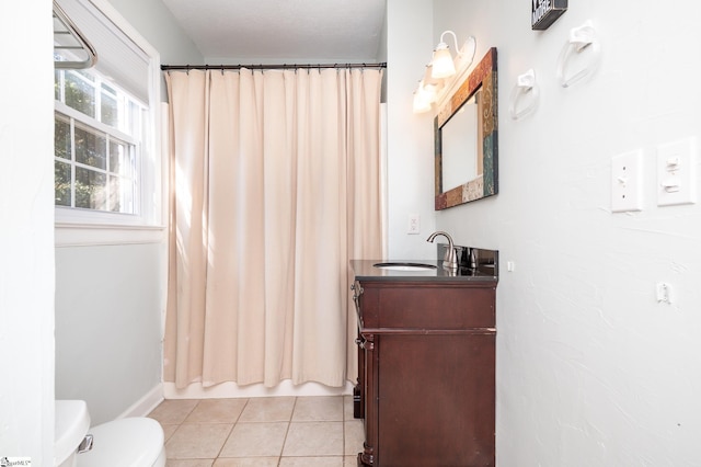 102 Todd Ave, Laurens, SC 29360 - full bathroom with toilet, vanity, and tile patterned floors