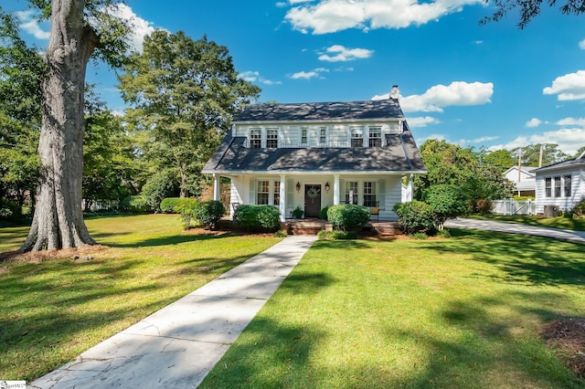 102 Todd Ave, Laurens, SC 29360 - view of front facade featuring a porch, a chimney, and a front lawn