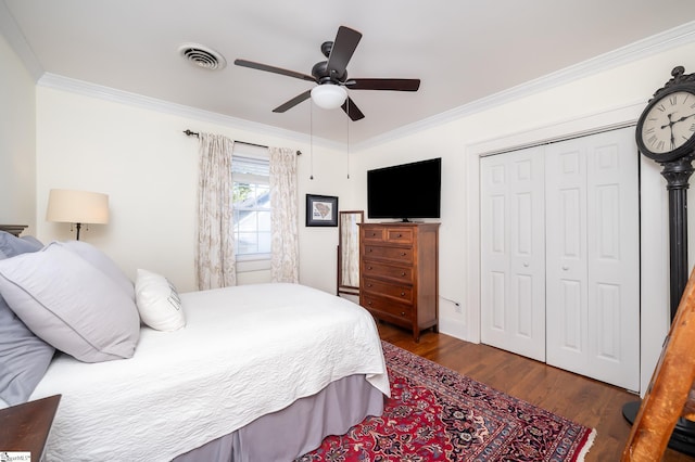 102 Todd Ave, Laurens, SC 29360 - bedroom with wood finished floors, crown molding, a closet, and a ceiling fan