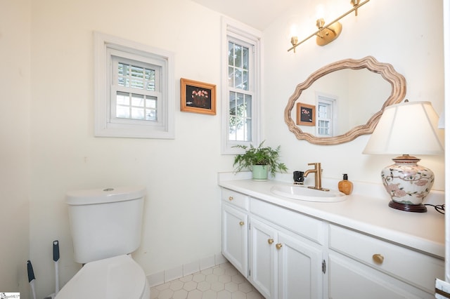 102 Todd Ave, Laurens, SC 29360 - half bathroom with vanity, toilet, and tile patterned floors