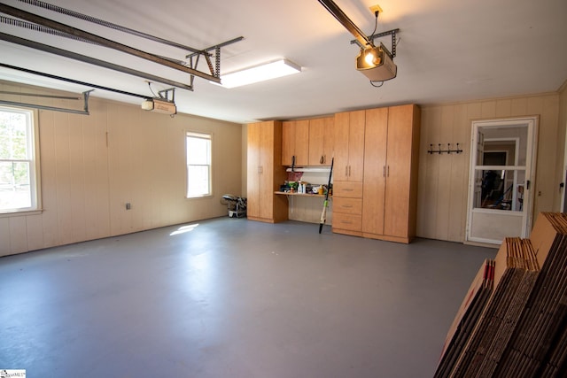 202 Centerpointe Rd, Belton, SC 29627 - garage with a garage door opener and wood walls