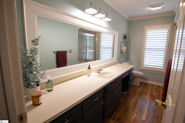 202 Centerpointe Rd, Belton, SC 29627 - full bath with vanity, toilet, ornamental molding, a shower with door, and wood finished floors