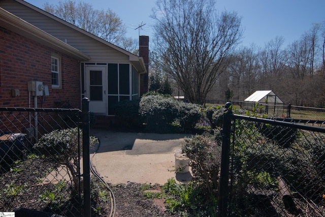 202 Centerpointe Rd, Belton, SC 29627 - fenced yard with a sunroom and entry steps