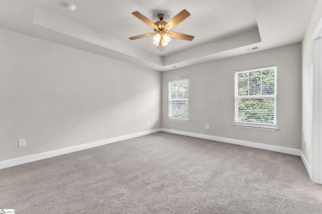 203 Rosewood Cir, Duncan, SC 29334 - carpeted empty room with a tray ceiling, a smoke detector, baseboards, and a ceiling fan