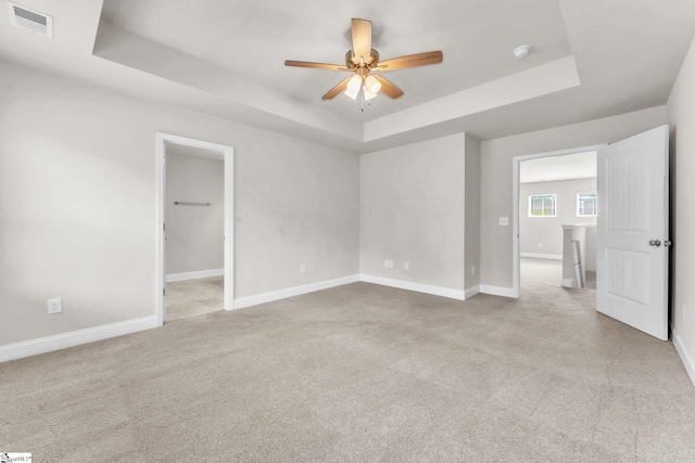203 Rosewood Cir, Duncan, SC 29334 - unfurnished room featuring a raised ceiling, a ceiling fan, baseboards, and carpet floors