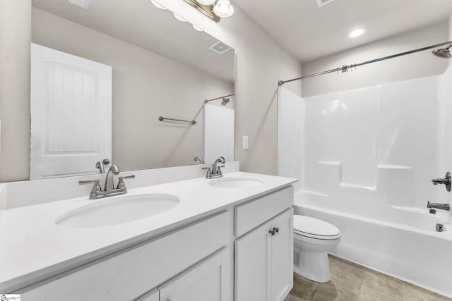 203 Rosewood Cir, Duncan, SC 29334 - bathroom featuring washtub / shower combination, double vanity, toilet, and recessed lighting