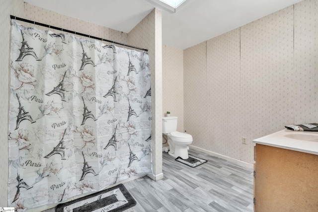 207 Starnes Rd, Laurens, SC 29360 - bathroom featuring toilet, wallpapered walls, vanity, curtained shower, and wood finished floors