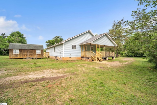 207 Starnes Rd, Laurens, SC 29360 - back of house featuring covered porch, a lawn, and crawl space