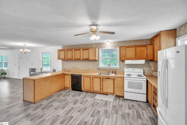 207 Starnes Rd, Laurens, SC 29360 - kitchen with white appliances, under cabinet range hood, a peninsula, light countertops, and ceiling fan