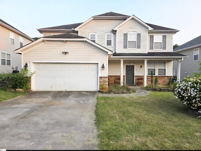 124 Scottish Ave, Simpsonville, SC 29680 - view of front of property featuring driveway, a front yard, an attached garage, covered porch, and stone siding