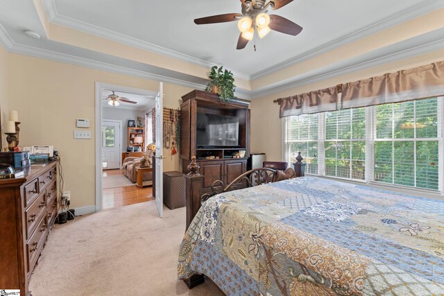 105 Garden View Ct, Piedmont, SC 29673 - bedroom with a raised ceiling, light carpet, ornamental molding, ceiling fan, and baseboards