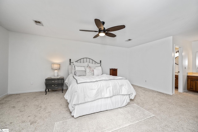 101 Shagbark Cir, Simpsonville, SC 29680 - bedroom featuring light colored carpet, baseboards, a ceiling fan, and ensuite bath