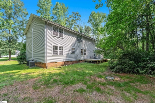 101 Shagbark Cir, Simpsonville, SC 29680 - rear view of house featuring crawl space, a yard, and central air condition unit
