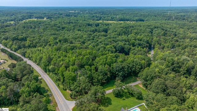 101 Shagbark Cir, Simpsonville, SC 29680 - aerial view of property and surrounding area featuring a heavily wooded area