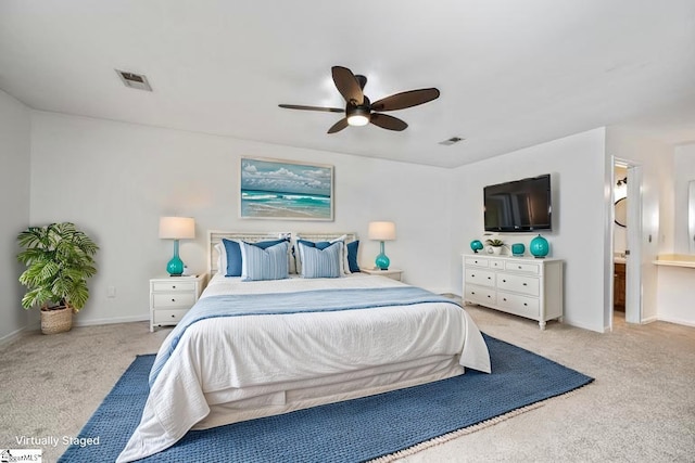 101 Shagbark Cir, Simpsonville, SC 29680 - carpeted bedroom with baseboards, a ceiling fan, and ensuite bathroom