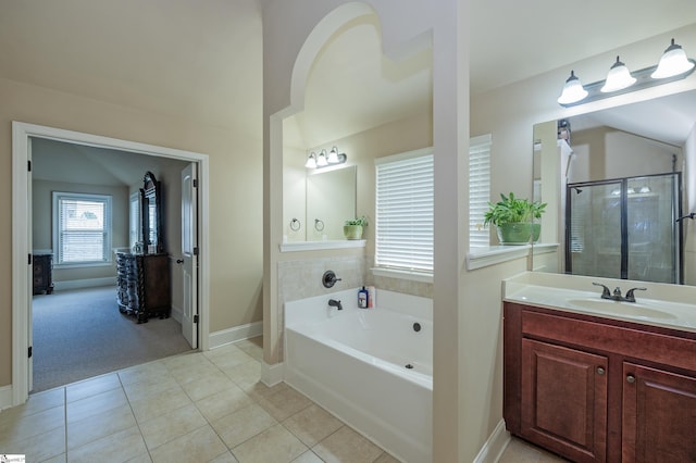 37 Wild Eve Way, Greer, SC 29650 - bathroom with a bath, tile patterned floors, vanity, a stall shower, and baseboards
