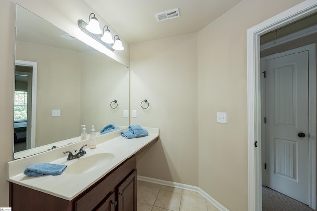 37 Wild Eve Way, Greer, SC 29650 - bathroom featuring vanity, baseboards, and tile patterned flooring