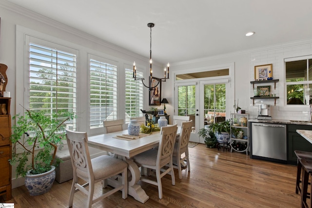 208 Deer Thicket Way, Taylors, SC 29687 - dining area featuring crown molding, wood finished floors, a chandelier, and french doors