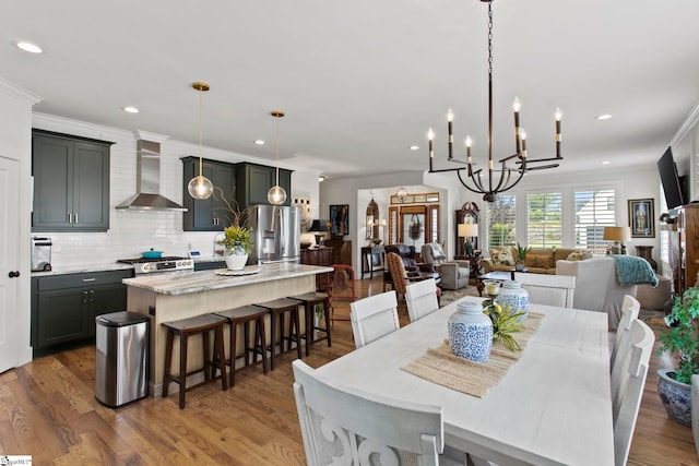 208 Deer Thicket Way, Taylors, SC 29687 - dining room featuring crown molding, wood finished floors, recessed lighting, and a chandelier