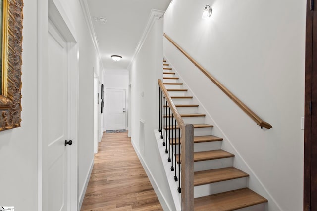 208 Deer Thicket Way, Taylors, SC 29687 - stairs featuring wood finished floors, crown molding, and baseboards
