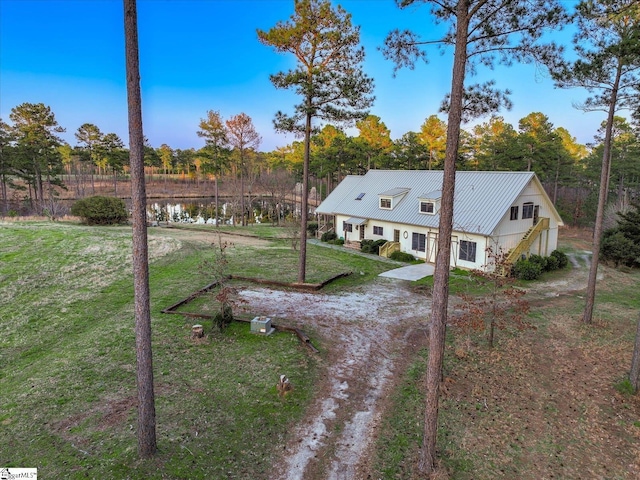 2164 Loncolnton Hwy, Elberton, GA 30635 - view of front of house with a front lawn, metal roof, and view of scattered trees