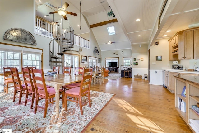 2164 Loncolnton Hwy, Elberton, GA 30635 - dining room featuring ceiling fan, high vaulted ceiling, light wood finished floors, beam ceiling, and stairway
