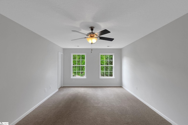 4 Dade Ct, Taylors, SC 29687 - spare room with baseboards, ceiling fan, and light colored carpet