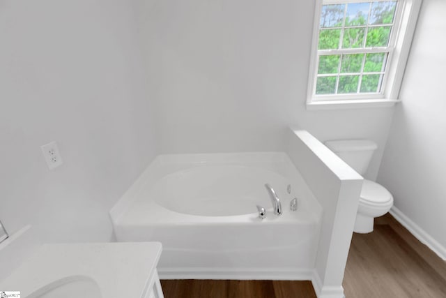 4 Dade Ct, Taylors, SC 29687 - full bath with vanity, a bath, toilet, wood finished floors, and baseboards