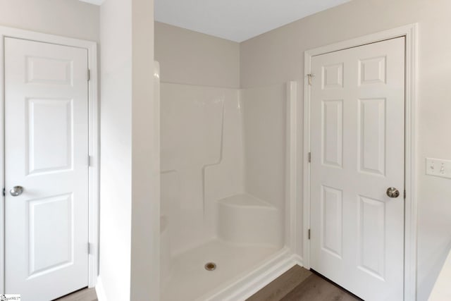 4 Dade Ct, Taylors, SC 29687 - bathroom featuring a shower and wood finished floors