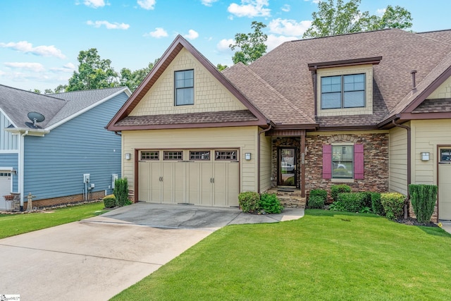 225 Chickadee Trl Unit B, Easley, SC 29642 - craftsman house with driveway, a shingled roof, a front lawn, a garage, and stone siding