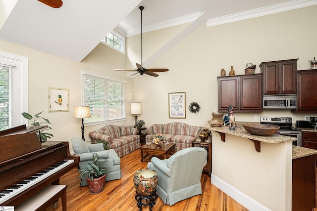 225 Chickadee Trl Unit B, Easley, SC 29642 - living area featuring a ceiling fan, ornamental molding, light wood-style floors, a high ceiling, and baseboards