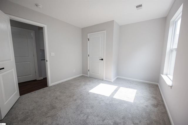 1305 Ledsham Ct, Greer, SC 29651 - unfurnished bedroom with carpet floors and baseboards