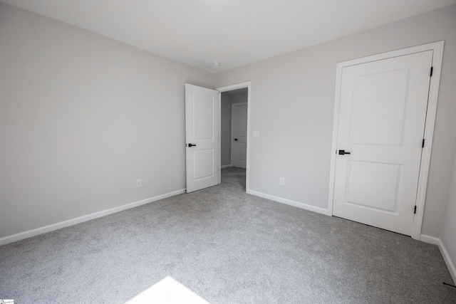 1305 Ledsham Ct, Greer, SC 29651 - unfurnished bedroom featuring carpet flooring and baseboards