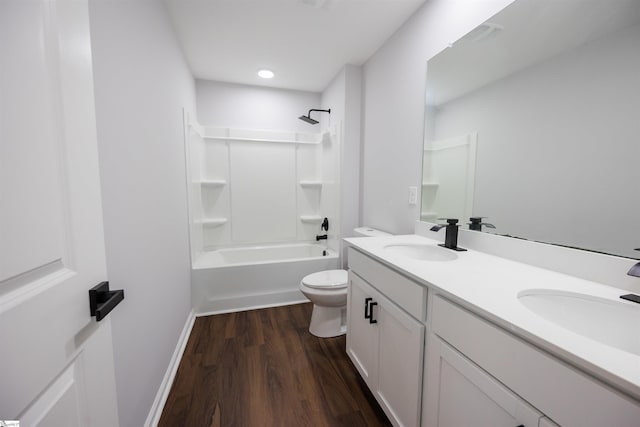 1305 Ledsham Ct, Greer, SC 29651 - bathroom featuring double vanity, toilet, wood finished floors, shower / bathtub combination, and baseboards