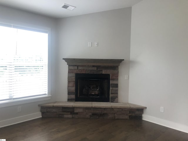 209 Claridge Way, Greer, SC 29651 - detailed view of wood finished floors, baseboards, and a fireplace