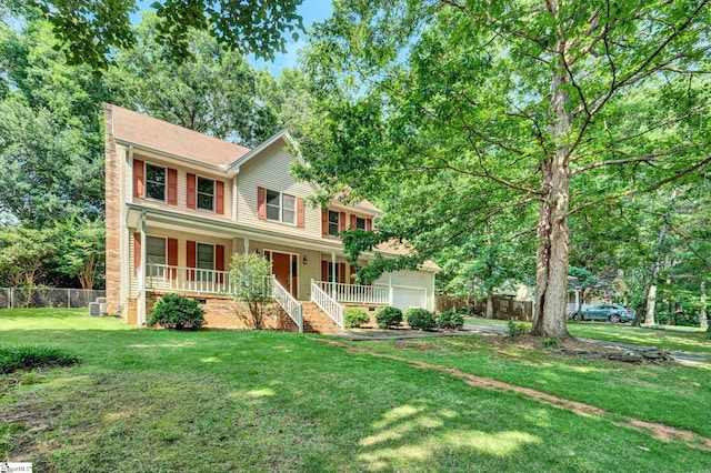 1107 Willow Branch Dr, Simpsonville, SC 29680 - view of front facade featuring covered porch, an attached garage, central air condition unit, and crawl space