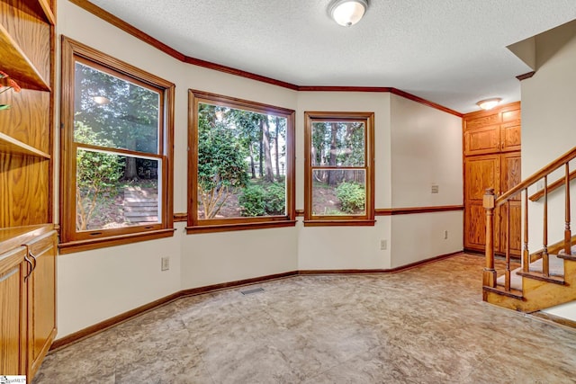 1107 Willow Branch Dr, Simpsonville, SC 29680 - unfurnished living room with stairway, a textured ceiling, crown molding, and baseboards
