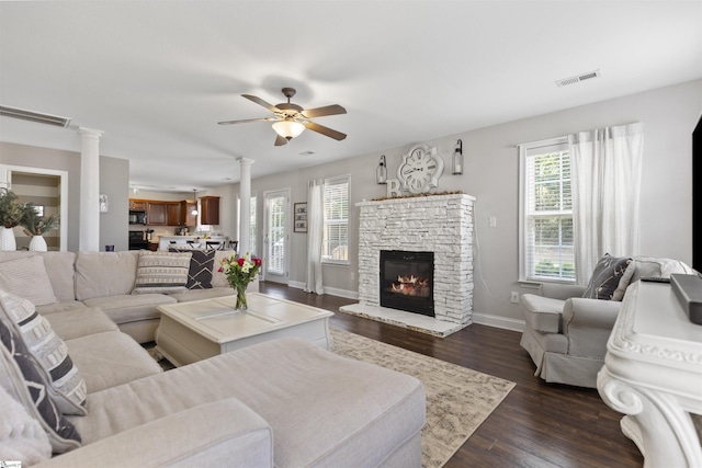 125 Saxon Falls Ct, Greenville, SC 29607 - living area featuring healthy amount of natural light, a ceiling fan, a fireplace, and baseboards