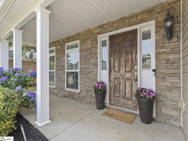 125 Saxon Falls Ct, Greenville, SC 29607 - property entrance with a porch and stone siding