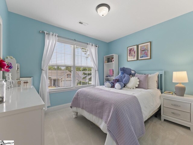 125 Saxon Falls Ct, Greenville, SC 29607 - bedroom featuring light carpet and baseboards