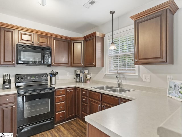 125 Saxon Falls Ct, Greenville, SC 29607 - kitchen with black appliances, a sink, and light countertops